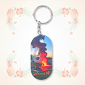 Volcano HI sublimated keychain on a pale tropical background without a shadow